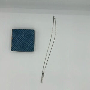 New in box vintage silver tone Avon Lariat fringe necklace